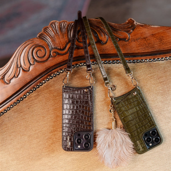 Two stylish women showcasing trendy bags in the New Arrivals collection, radiating fashion and confidence.