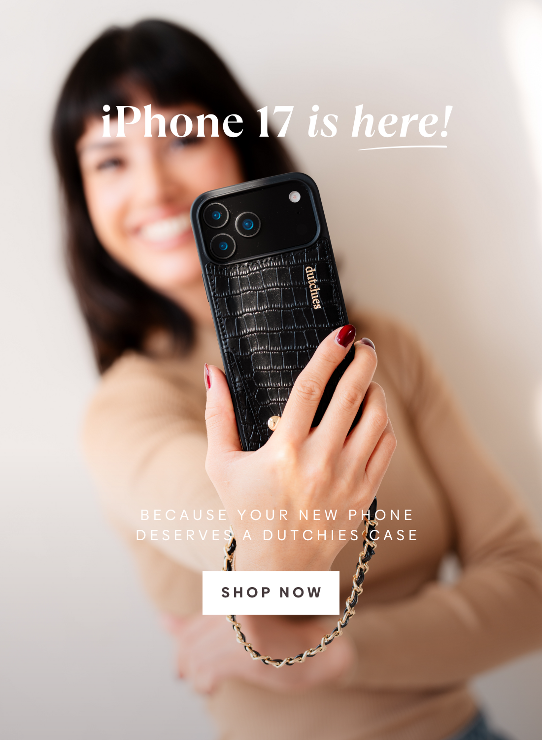 A person holding an iPhone 17 with a stylish case, showcasing the excitement of iPhone 17 PRO.