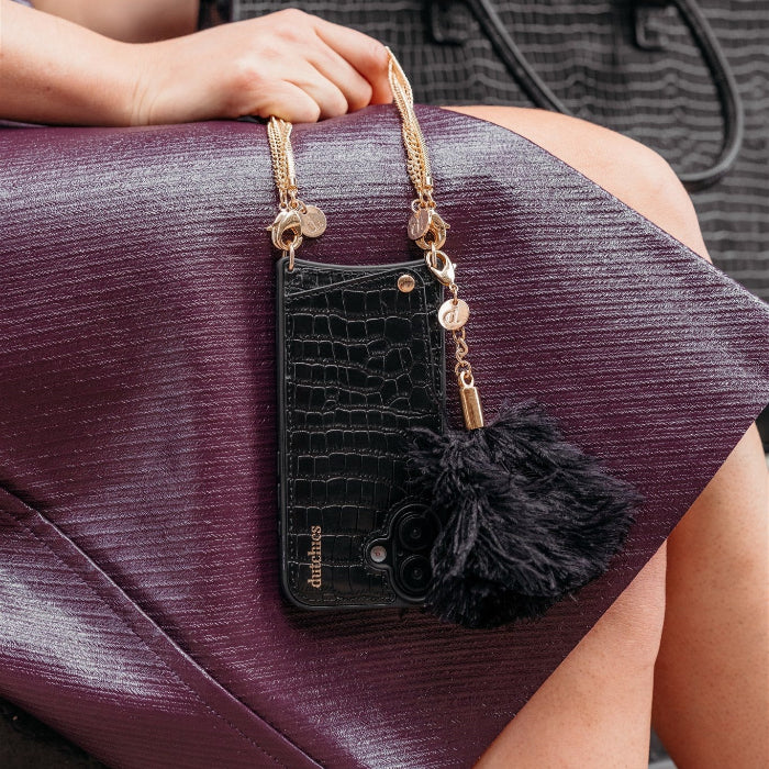 Vavavoom | Keychain attached to a phone case with cardholder in Burgundy, stylish accessory for phone and bag.