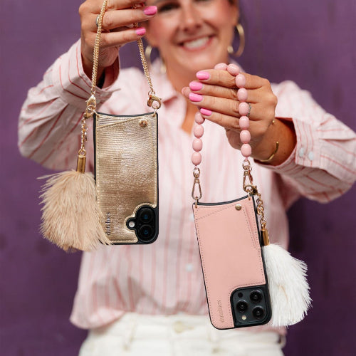 Vavavoom | Keychain attached to stylish phone cases with cardholders in pink and gold, showcasing a fun fluffy charm.