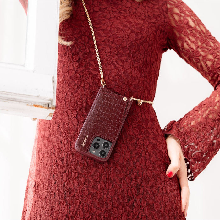Phone Chain | Spanish | Burgundy featuring a stylish phone case with cardholder, perfect for hands-free convenience.
