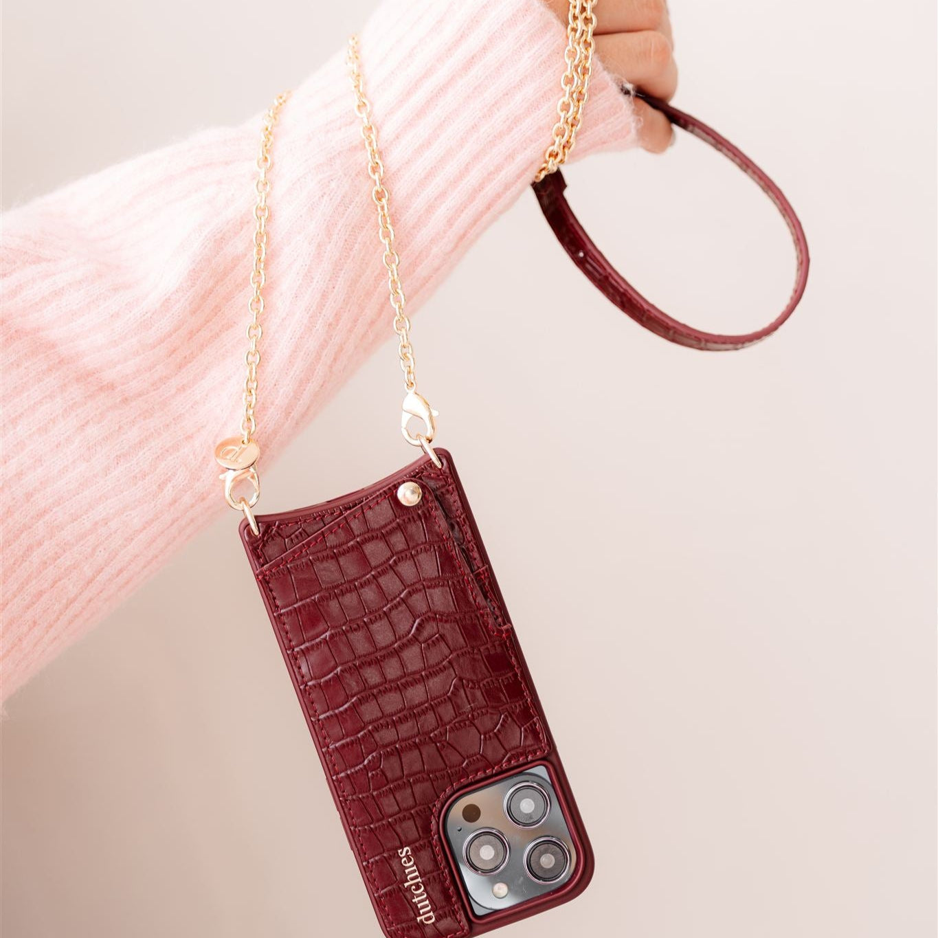 Phone Chain | Spanish | Burgundy featuring a stylish phone case with cardholder and trendy strap.