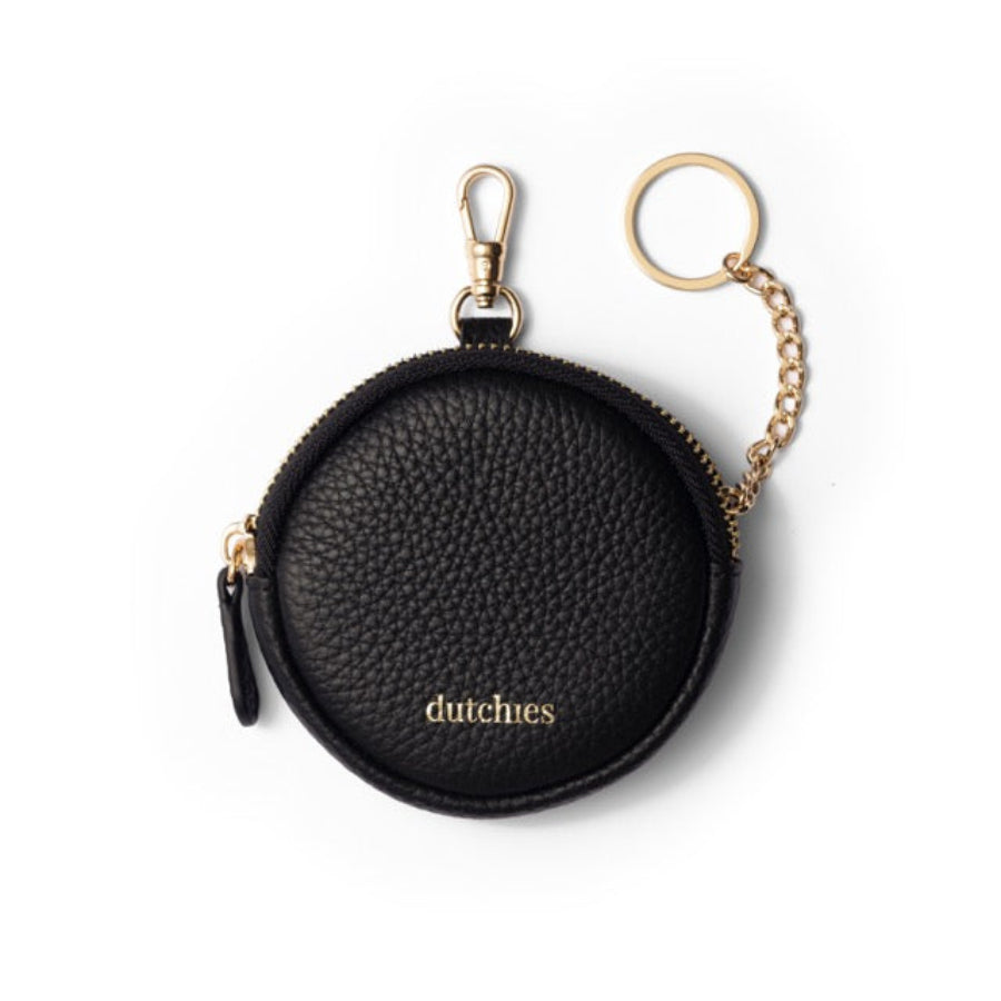 Mini Phone Bag Emma | Black, round pouch in genuine leather with clip, perfect for storing essentials on the go.