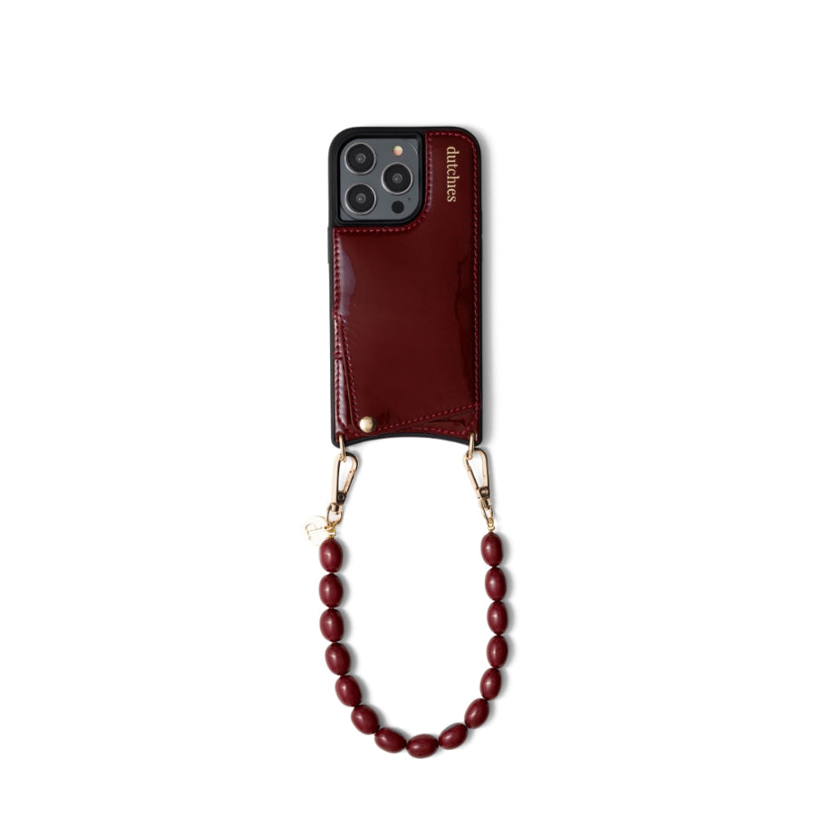 Phone Charm | Beaded | Charley - stylish maroon phone case with beaded charm for a bold look.