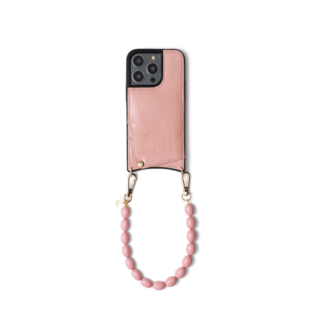 Pink phone charm made with high-quality beads, stylishly enhancing your phone case.