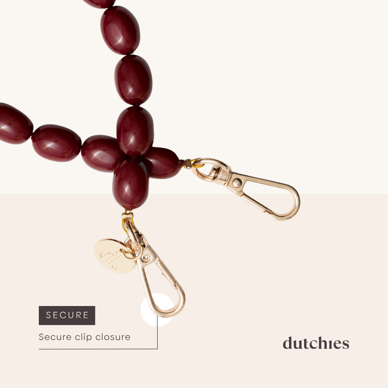 Beaded Phone Chain | Charley close-up of burgundy beads and secure clip closure for phone strap or charm.
