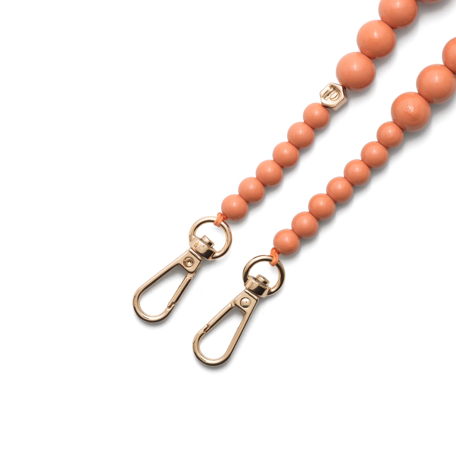 Phone Charm | Beaded | Freya: close-up of orange beaded phone charm strap with gold clips.