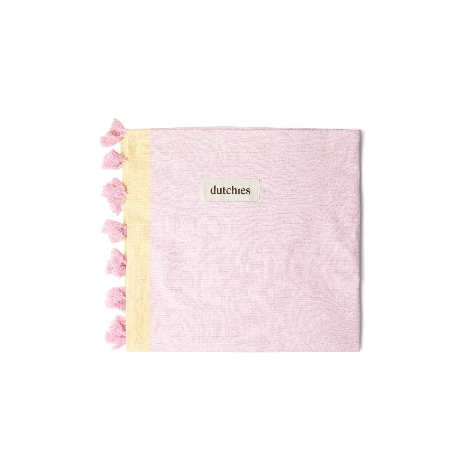 Hamam towels in soft pink with yellow trim and tassels, perfect for your beach bag and summer adventures.