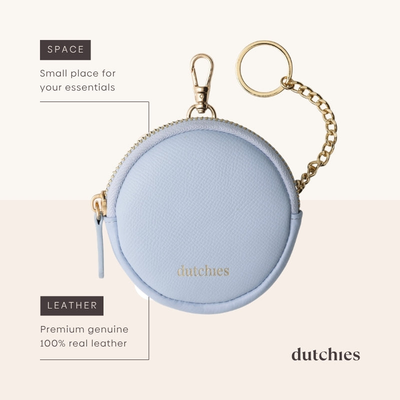 Mini Phone Bag Emma | Blue - Round leather pouch for essentials with clip and keychain, stylish and functional.