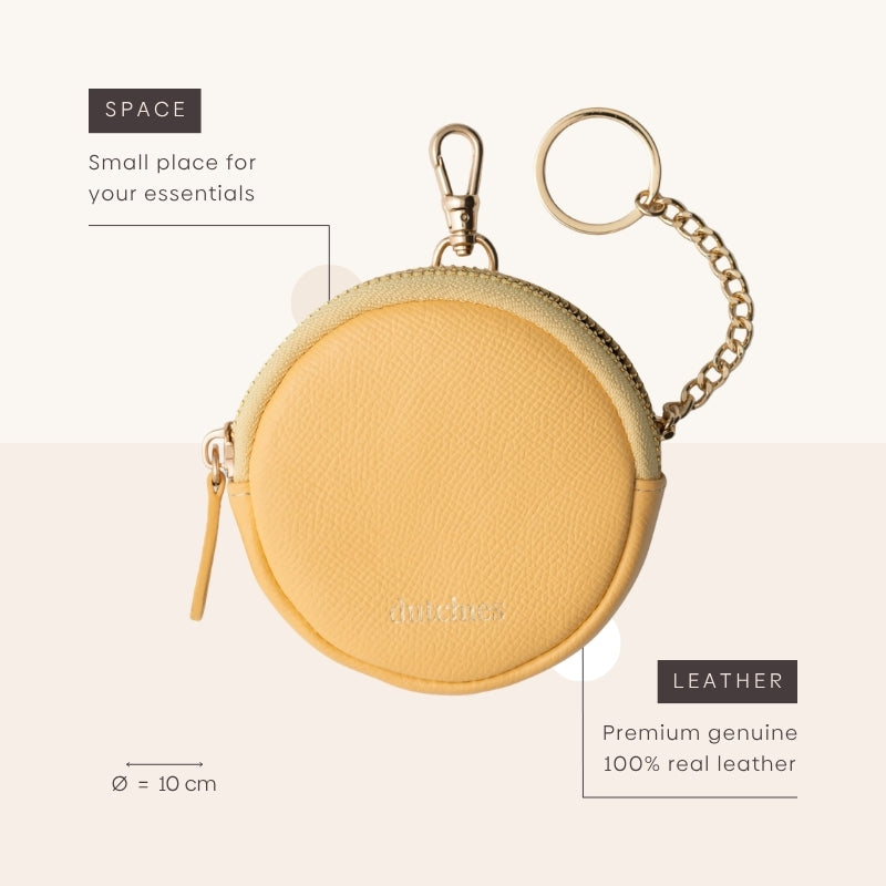 Mini Phone Bag Emma | Yellow - stylish round pouch in genuine leather for your essentials on the go.