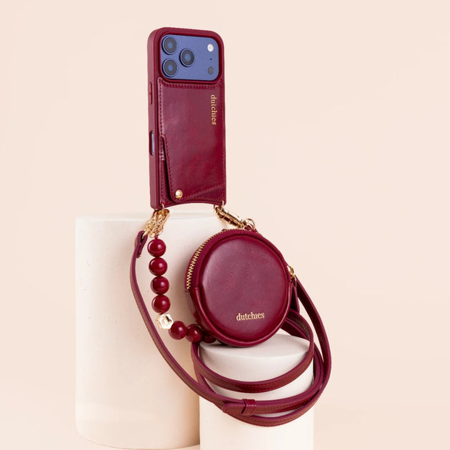 Luxury Set | iPhone | Raspberry Red featuring a stylish phone case and accessory pouch on a light background.