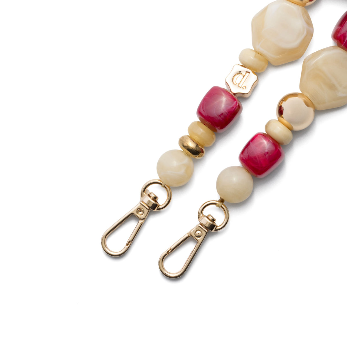 Close-up of a beige beaded Phone Charm | Beaded | Mala with gold clasps and vibrant beads.