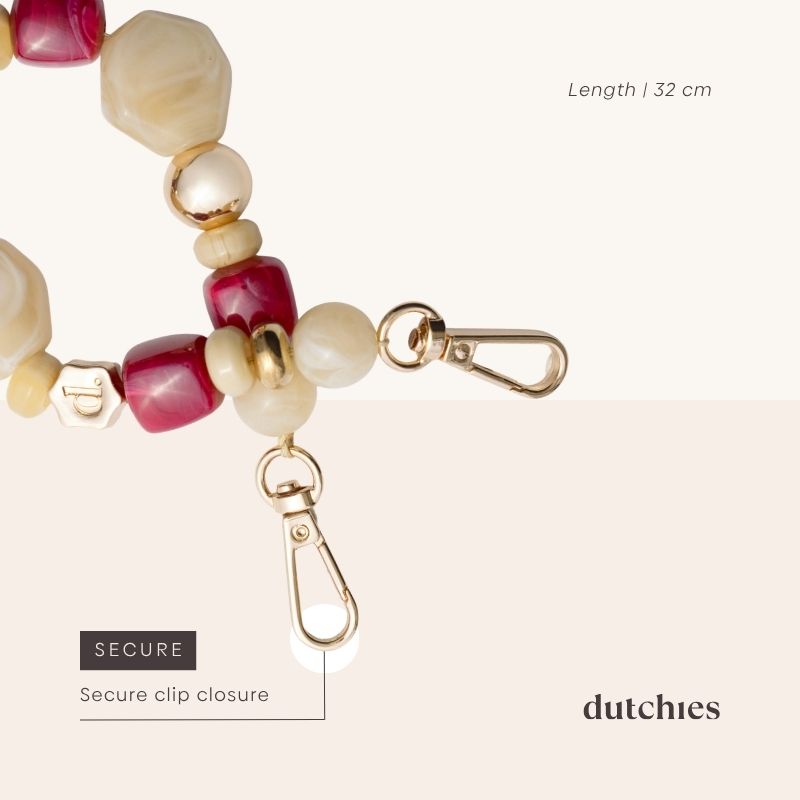 Close-up of Phone Charm | Beaded | Malafeaturing colorful beads and a secure clip closure.