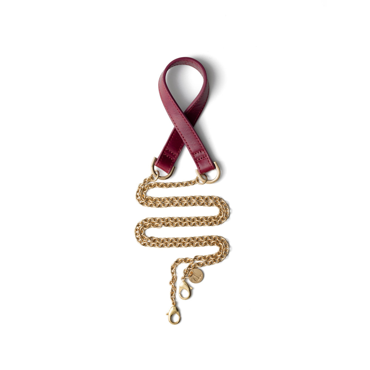 Phone Chain | Spanish | Raspberry Red featuring a stylish gold chain and burgundy leather straps.