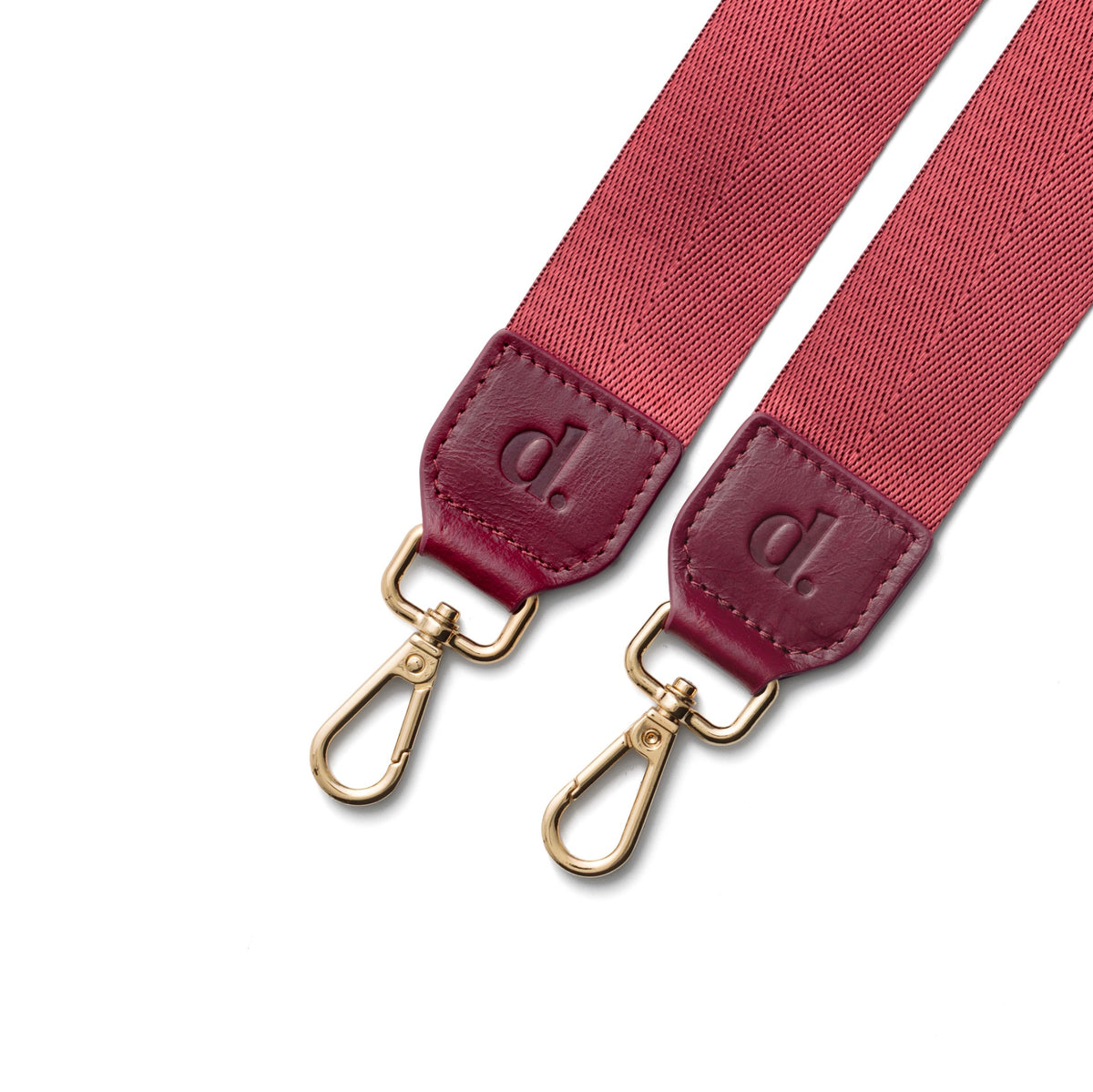 Close-up of the Phone Strap | Basic | Raspberry Red with gold clips and leather accents.