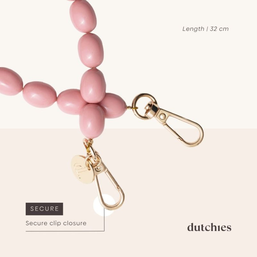 Pink phone charm with secure clip closure, made from high-quality beads, designed to enhance your phone case.