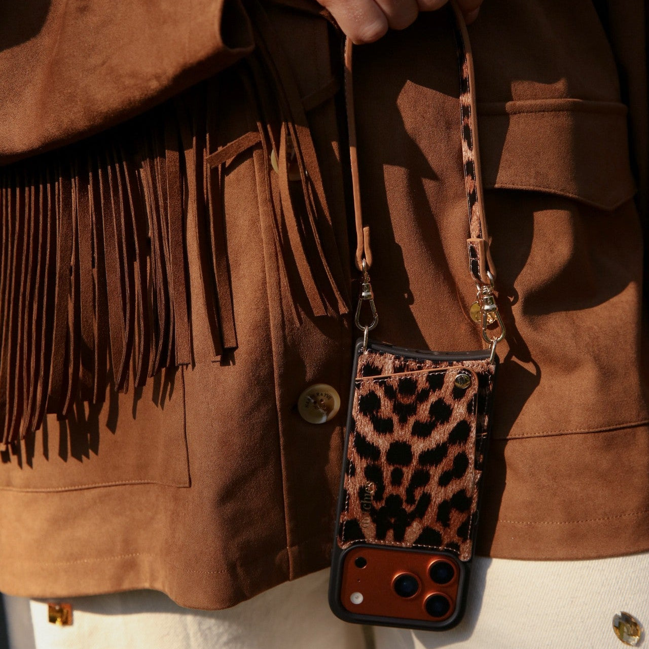 Phone charm | Slimline | Leopard hanging from stylish outfit with fringe details.