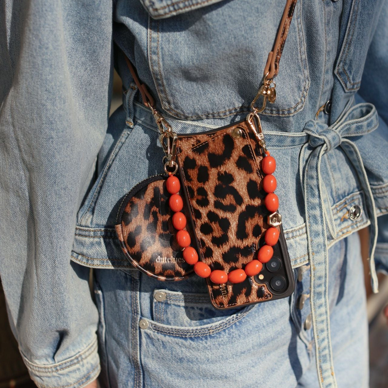 Luxury set | Samsung | Leopard displayed on a stylish denim outfit, showcasing its chic design and practicality.