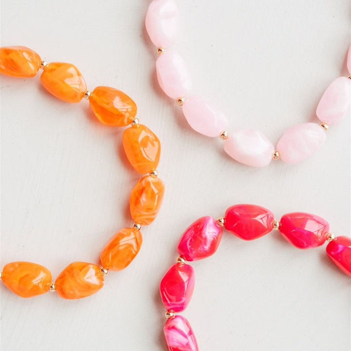 Phone Charm | Beaded | Beatrice featuring vibrant pink and orange beads, part of the Power Women collection.