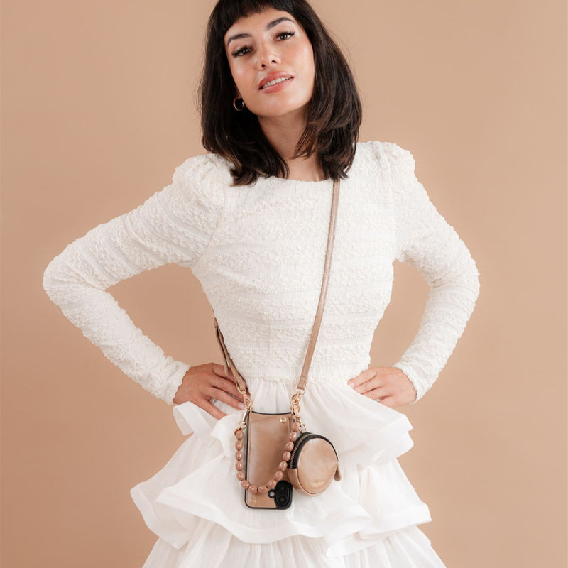 Phone Charm | Beaded | Rachel showcased on a model in a white dress with a beaded strap.