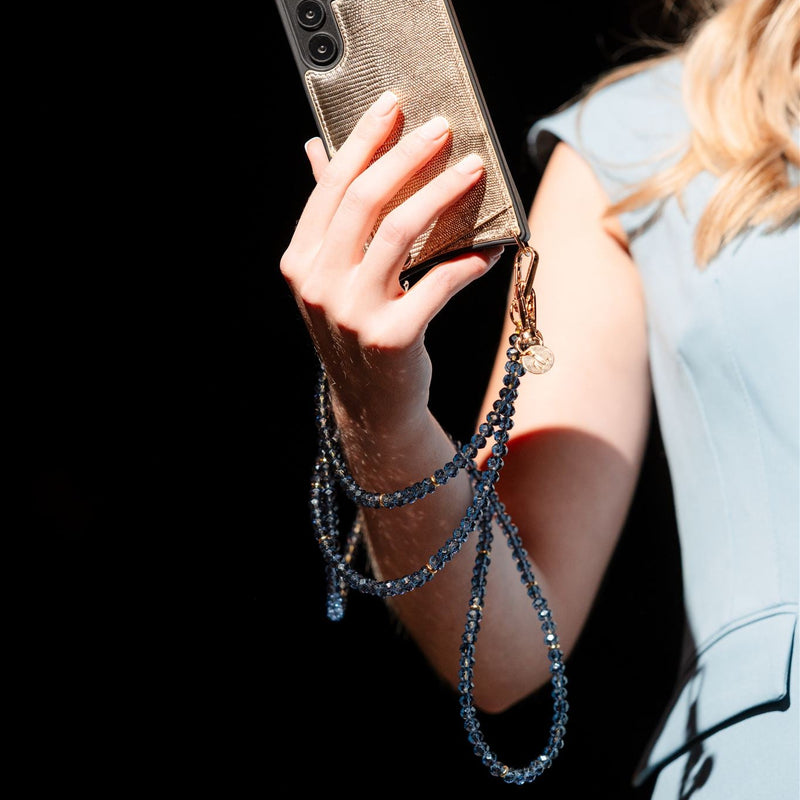 Phone Chain | Beaded | Grace featuring blue glass pearls, featuring a stylish gold phone case.