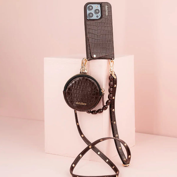 Luxury set | iPhone | Chocolate Brown: Glamorous phone case and matching wallet on a minimalistic display.