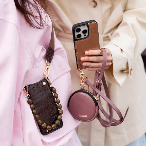 Phone strap | Slimline | Mauve showcased with stylish phone cases on a trendy outfit.