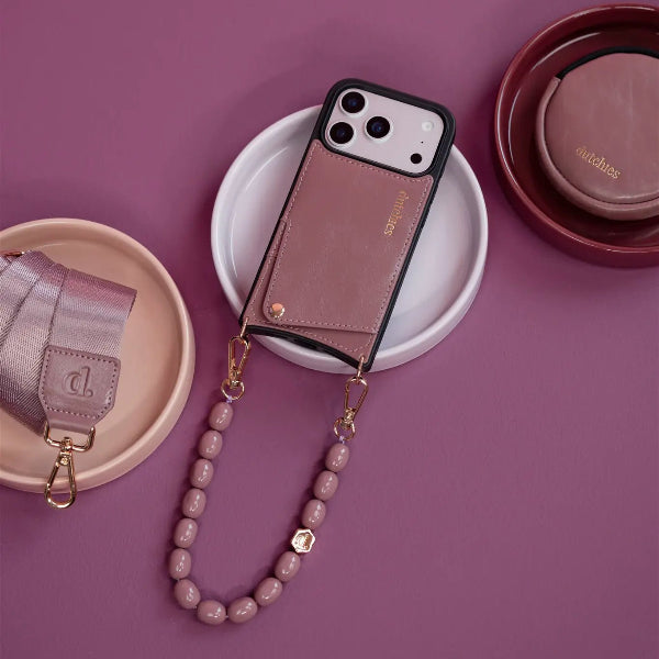 Phone Charm | Beaded | Eileen displayed with mauve accessories and a stylish phone case.