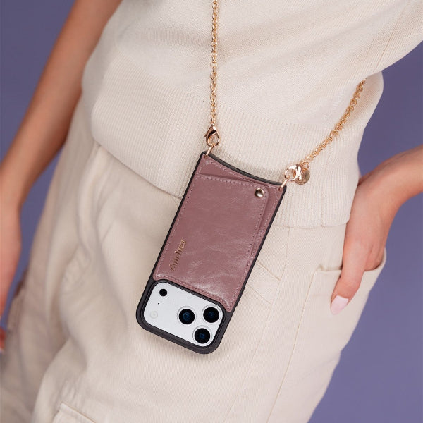 Spanish Chain Set | iPhone | Mauve stylishly worn around the neck with a gold chain, showcasing convenience and fashion.