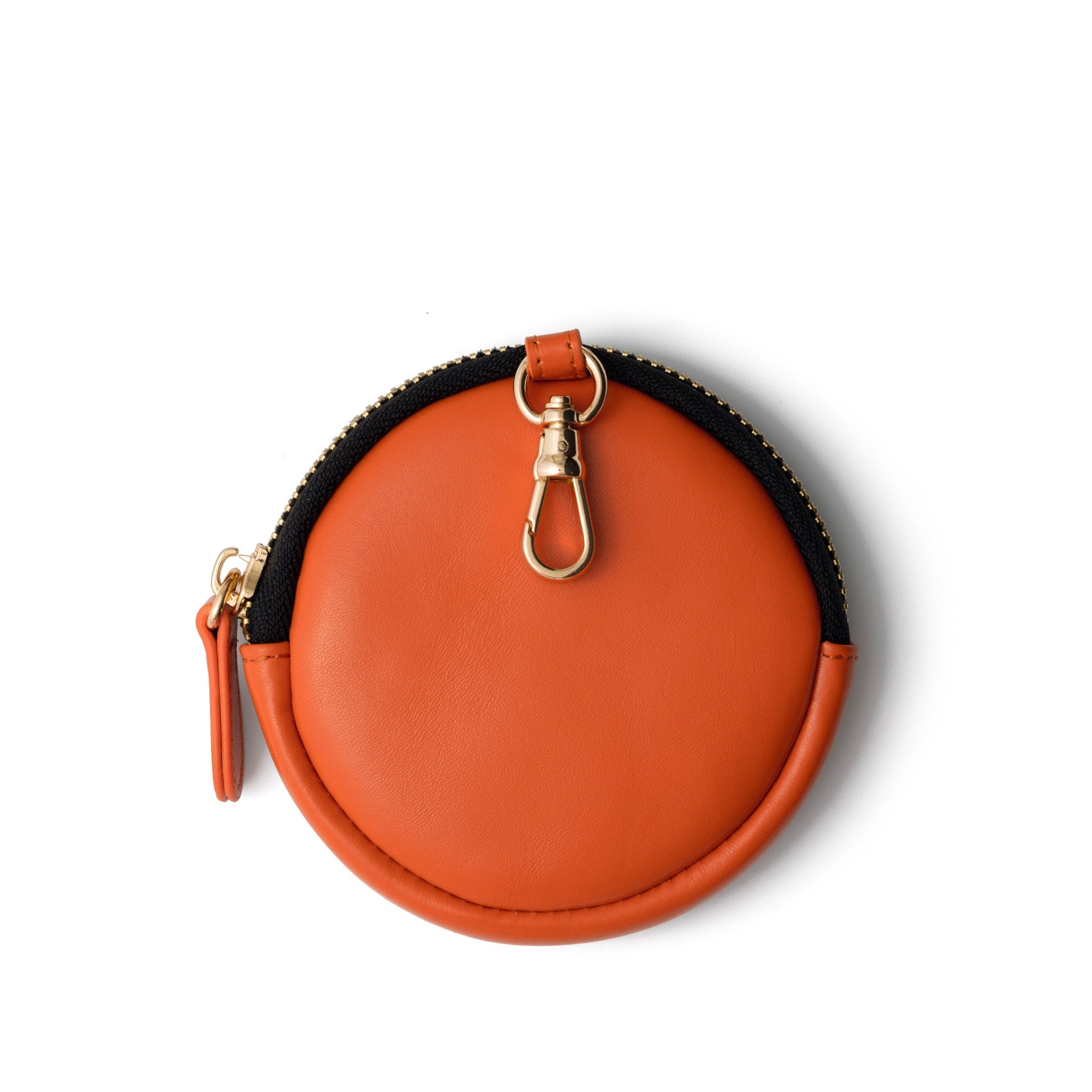 Mini Phone Bag Emma | Orange - round leather pouch with clip, perfect for storing small essentials on the go.