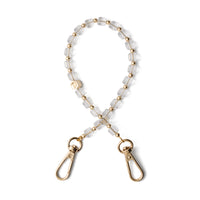 Phone Charm | Beaded | Mae, stylish transparent phone wristlet with glass beads and gold clasps.