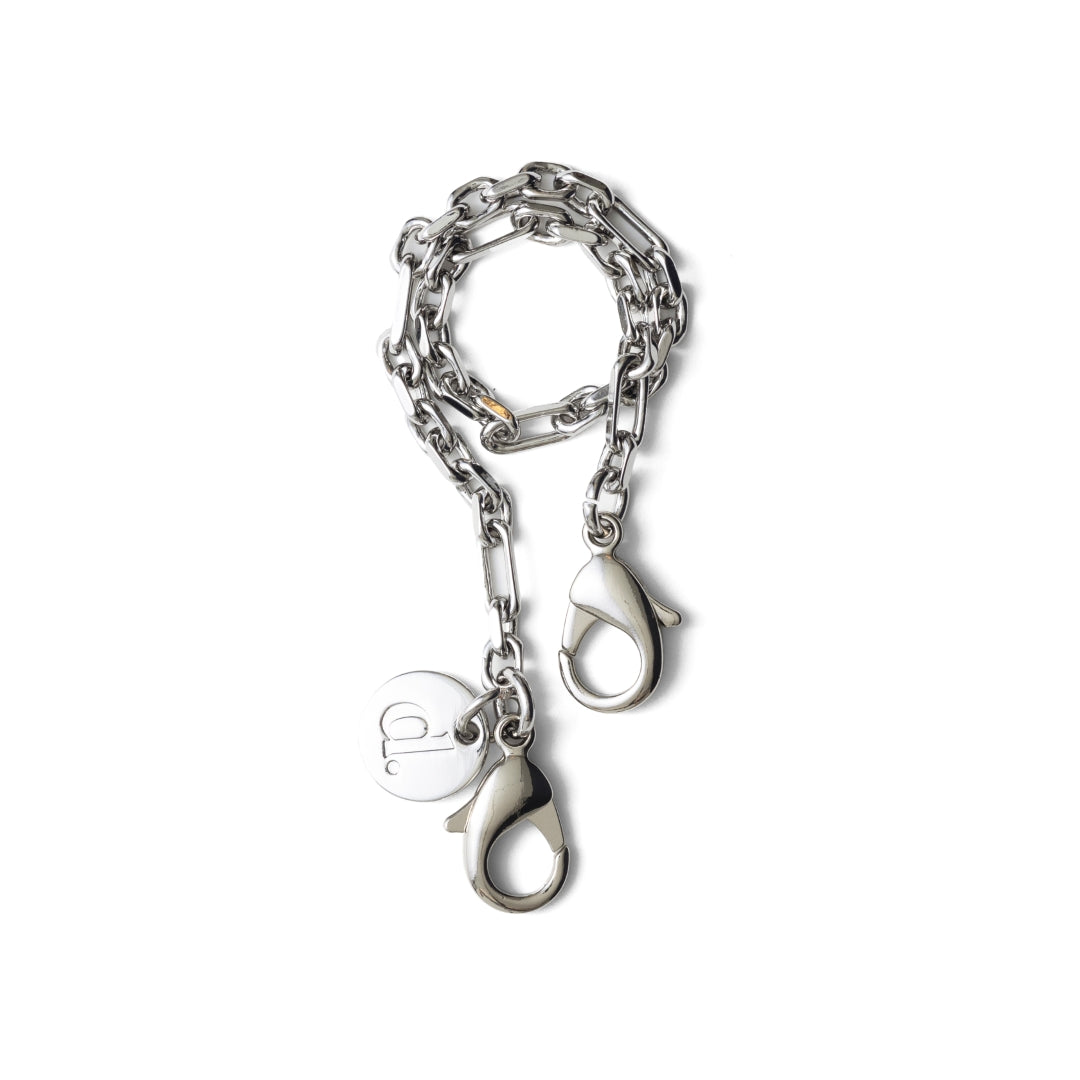 Phone Charm | Silver | Dutch Bandolier - Stylish silver mobile phone charm with clips for personalization.