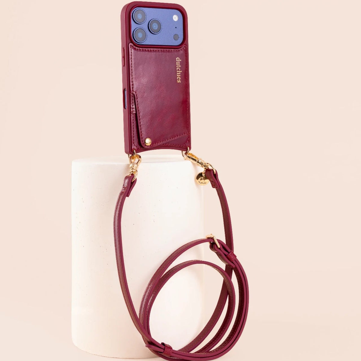 Classic Set | iPhone | Raspberry Red - A stylish case with a strap, perfect for modern convenience.