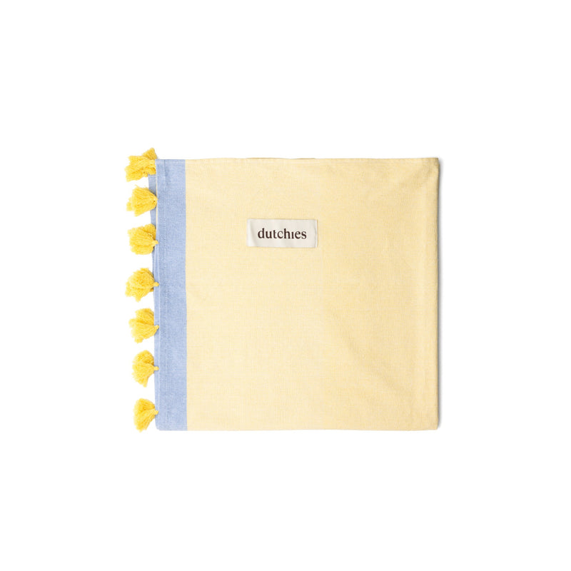 Hamam towels in yellow with blue trim and tassels, perfect for your beach bag this summer!