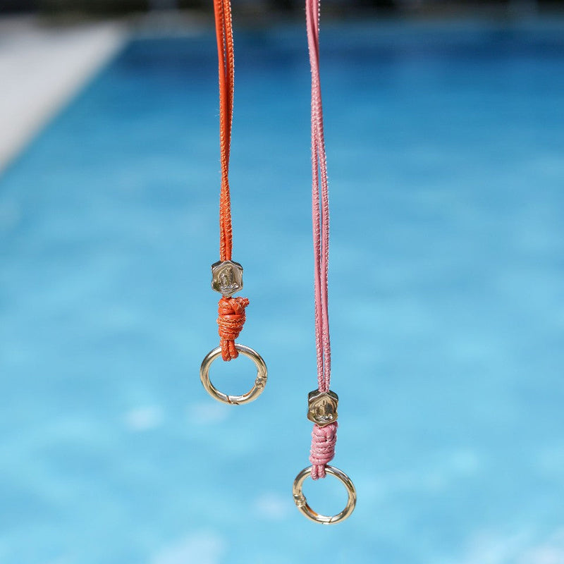 Sunglass Strap | Pink - Stylish and practical accessory for sunglasses, featuring a key ring and metal finishes.