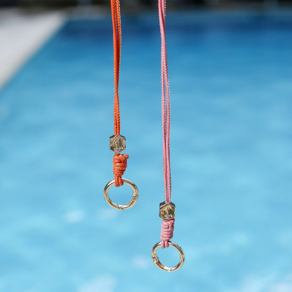 Sunglass Strap | Pink - Stylish and practical accessory for sunglasses, featuring a key ring and metal finishes.