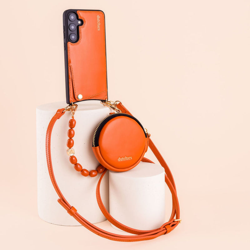 Samsung Case | Orange on display with matching accessory, showcasing premium leather craftsmanship and stylish design.