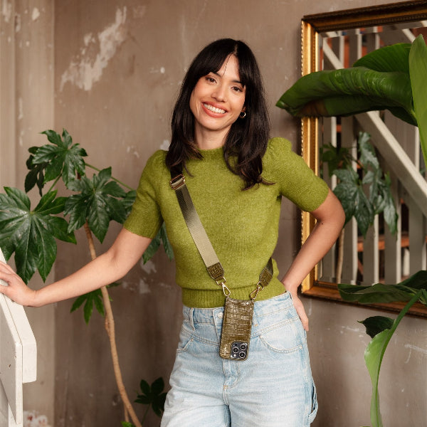Phone Strap | Basic | Olive Green on a stylish model, showcasing versatility and functionality with everyday outfits.