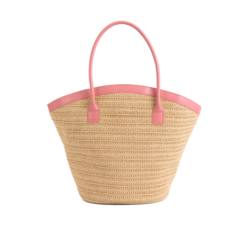 Beach Bag | Raffia Pink: a stylish straw beach bag with pink handles for summer fun.