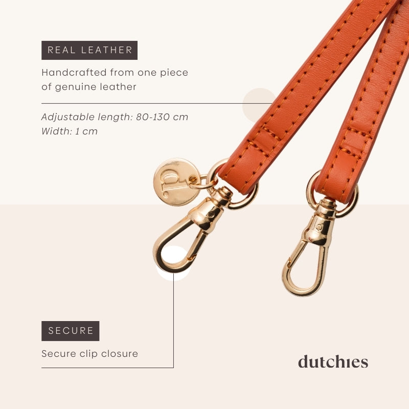 Phone strap | Slimline | Orange close-up showing real leather and secure clip closure.