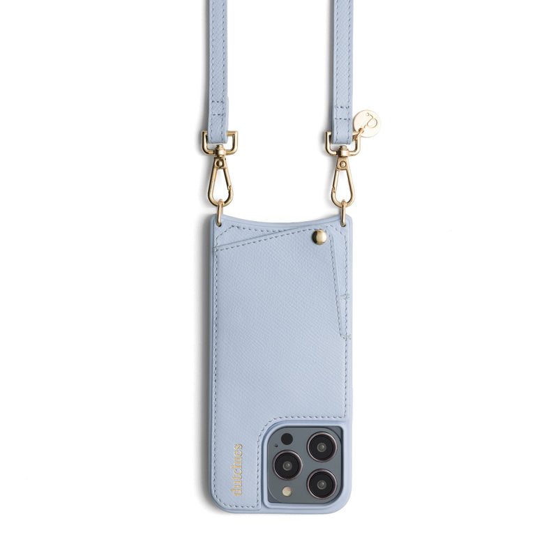 Phone strap | Slimline | Blue on a stylish light blue phone case with gold clips.