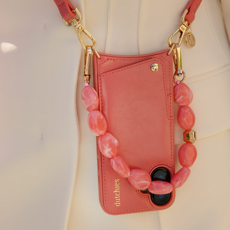 Phone Charm | Beaded | Ida showcasing a stylish pink phone charm strap with decorative beads.