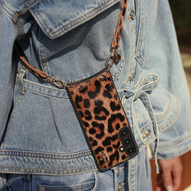Classic set | Samsung | Leopard - Stylish leopard case with strap on denim jacket.
