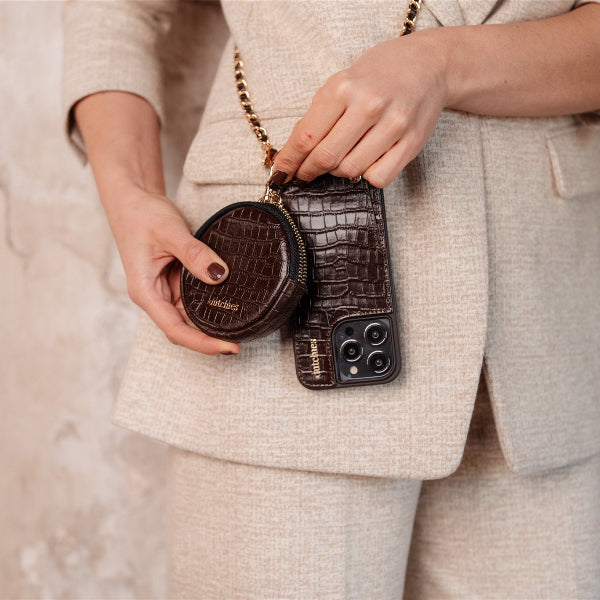 Mini Phone Bag Emma | Chocolate Brown showcased with a stylish outfit, highlighting its elegant design and practicality.