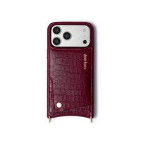 iPhone Case | Burgundy handcrafted leather phone case with cardholder and phone strap attachments.
