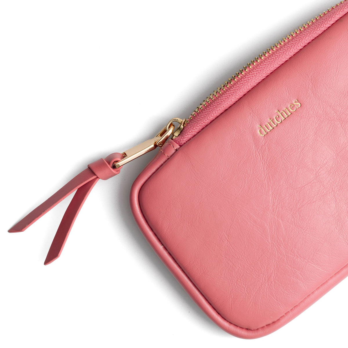 Phone Bag Rose | Pink - stylish close-up of a handmade leather phone pouch in soft pink with gold zipper.