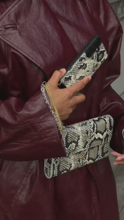 Samsung Case | Snake showcased with a stylish outfit, featuring a snake print design and cardholder.