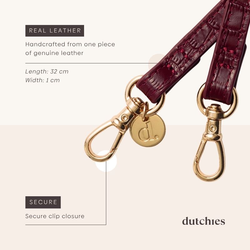Slimline | Strap | Burgundy features secure clip closure and is handcrafted from genuine leather for durability.